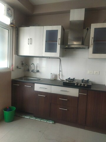 Kitchen in 3 BHK Apartment at Ramprastha Pearl Court, Vaishali Sector 7 – for Sale