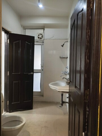 Bathroom in 3 BHK Apartment at Ramprastha Pearl Court, Vaishali Sector 7 – for Sale