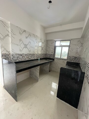Kitchen in 1 BHK Apartment at DGS Sheetal Tapovan, Pathan Wadi – for Rent