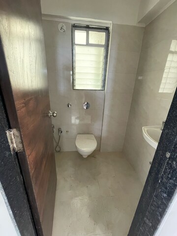 Bathroom in 1 BHK Apartment at DGS Sheetal Tapovan, Pathan Wadi – for Rent