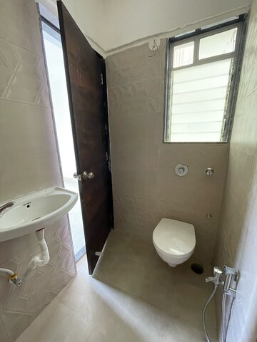 Bathroom in 1 BHK Apartment at DGS Sheetal Tapovan, Pathan Wadi – for Rent