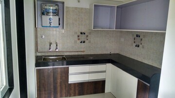 Kitchen in 2 BHK Apartment at Nirman Abhilasha, Lohgaon – for Rent