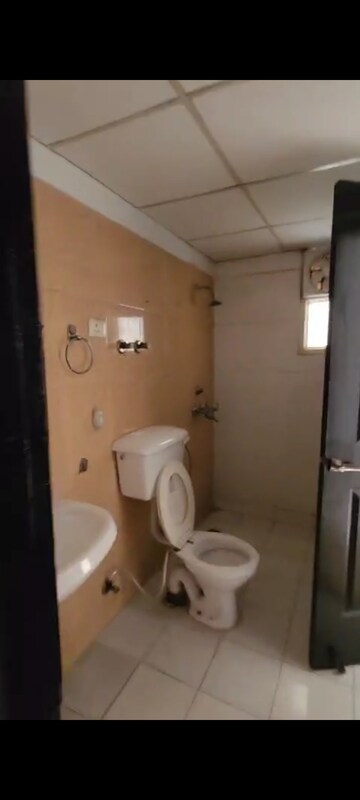 Bathroom in 2 BHK Apartment at Bulland Heights, Sain Vihar – for Sale
