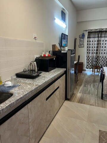 Kitchen in 1 BHK Apartment at Paramount Golfforeste, Zeta I Greater Noida – for Rent