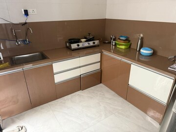 Kitchen in 2 BHK Apartment at RR Lunkad 66 Avenue, Pimple Nilakh – for Rent