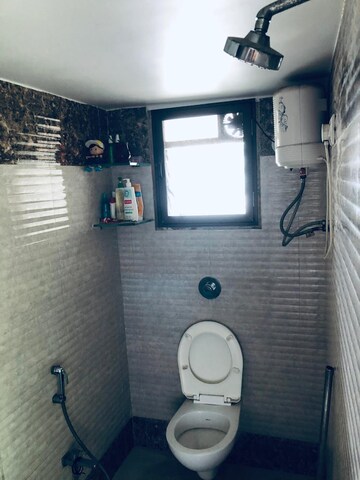 Bathroom in 2 BHK Apartment at Kings Heights, Nahur East – for Rent