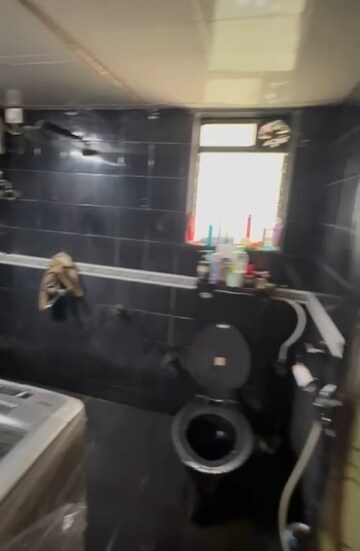 Washroom in 1 BHK Apartment at New Jay Palace, Yari Road – for Rent