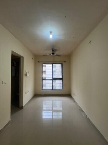 Living Room in 1 BHK Apartment at Lodha Golden Dream, Dombivli East – for Rent