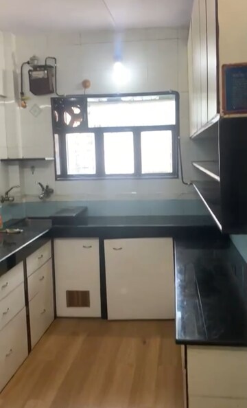 Kitchen in 2 BHK Apartment at Nirman Cottage, Versova – for Rent