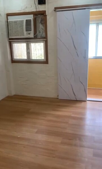 Room in 2 BHK Apartment at Nirman Cottage, Versova – for Rent