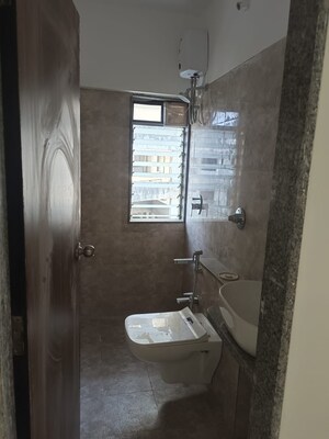 Bathroom in 1 BHK Apartment at Parinee Essence, Kandivali West – for Sale
