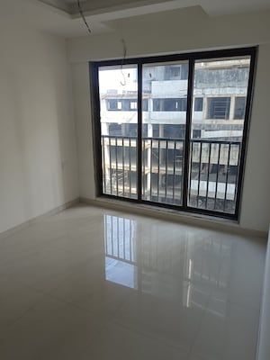Room in 1 BHK Apartment at Parinee Essence, Kandivali West – for Sale