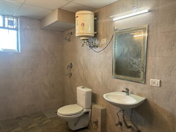 Bathroom in 3.5 BHK Apartment at Orchid Island, Sector 51 – for Rent