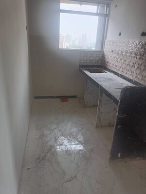 Kitchen in 2 BHK Apartment at Rajasthan Surya Square, Matunga – for Sale