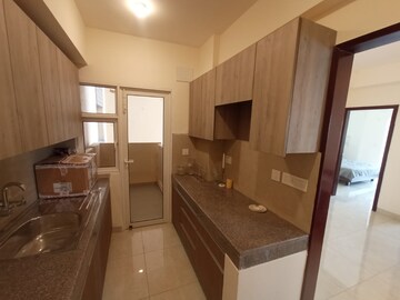 Kitchen in 2 BHK Apartment at Eldeco Accolade, Sohna Sector 2 – for Rent