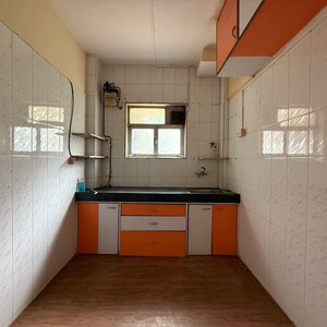 Kitchen in 2 BHK Apartment at Sneh Varsha Society, Chakala – for Sale