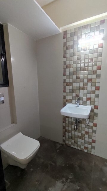 Bathroom in 1 BHK Apartment at Modispaces Amizarna, Malad West – for Rent