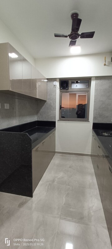 Kitchen in 2 BHK Apartment at Sheth Irene, Malad West – for Rent