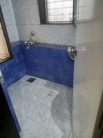 Bathroom in 1 BHK Apartment at Gundecha Valley of Flowers, Kandivali East – for Rent