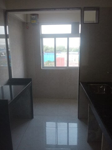 Kitchen in 1 BHK Apartment at Ranuja Ramdev, Bhayandar East – for Sale