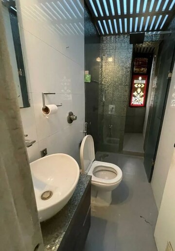 Bathroom in 3 BHK Apartment at Mahindra Aura, Sector 110a – for Rent