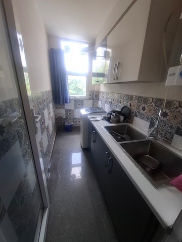 Kitchen in 4 BHK Builder Floor at Malibu Shopping Arcade, Sector 47 – for Sale
