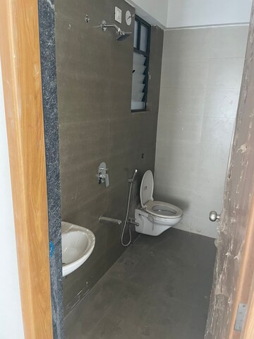 Bathroom in 2 BHK Apartment at Swaraaj Heights, Punawale – for Rent