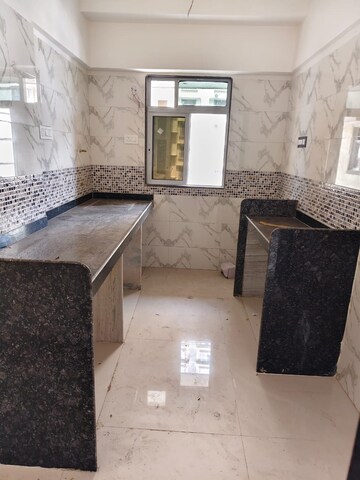 Kitchen in 1 BHK Apartment at DGS Sheetal Tapovan, Malad East – for Sale