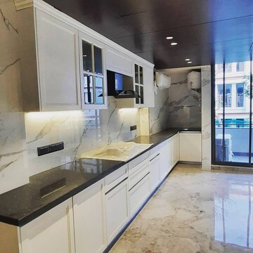 Kitchen in 3.5 BHK Apartment at Ambience Island, Sector 24 – for Rent
