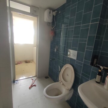 Bathroom in 1 BHK Apartment at Raymond Realty Phase II, Swastik Garden – for Rent