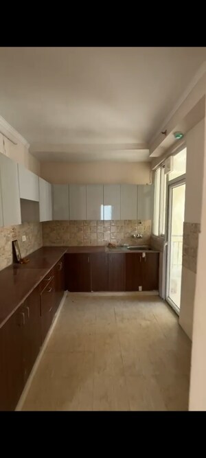 Kitchen in 3 BHK Apartment at Amrapali Golf Homes, Sector 4 Greater Noida – for Sale