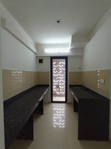 Kitchen in 2 BHK Apartment at Lodha Palava Downtown, Dombivli East – for Sale