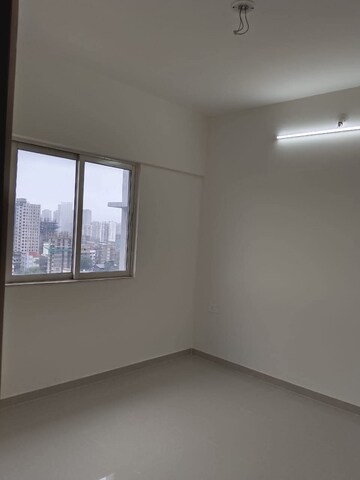 Room in 2 BHK Apartment at Omkar Signet, Malad East – for Rent