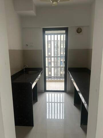 Kitchen in 2 BHK Apartment at Lodha Downtown, Dombivli East – for Rent
