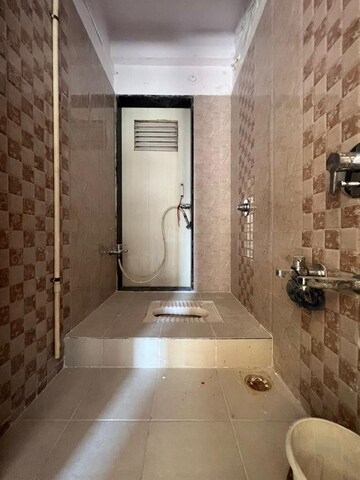 Bathroom in 1 BHK Apartment at Parsik Nagar – for Sale