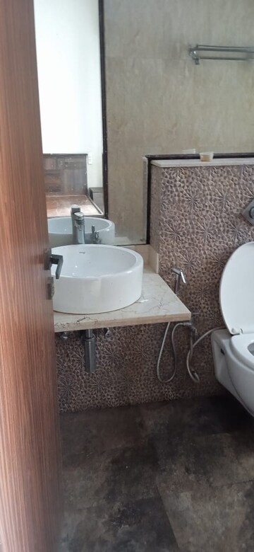 Bathroom in 3 BHK Apartment at Omkar Alta Monte, Malad East – for Rent
