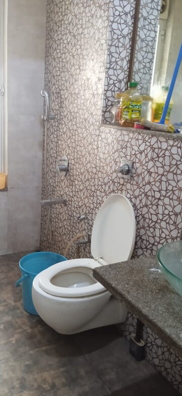 Bathroom in 3 BHK Apartment at Omkar Alta Monte, Malad East – for Rent
