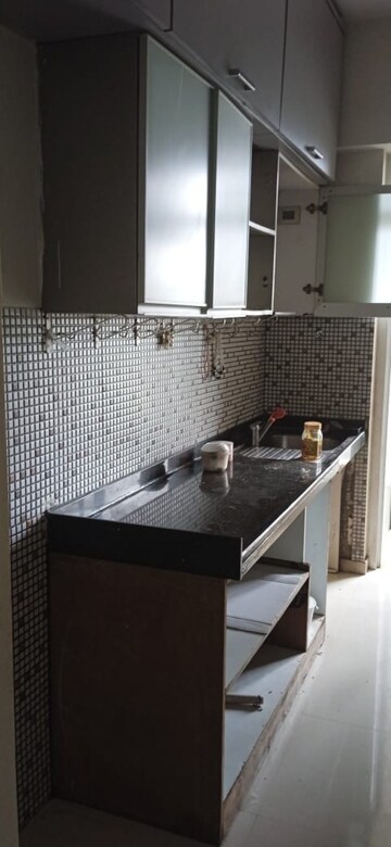 Kitchen in 3 BHK Apartment at Omkar Alta Monte, Malad East – for Rent