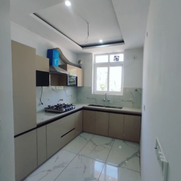 Kitchen in 3 BHK Apartment at Artique Uptown Skylla, International Airport Road – for Rent
