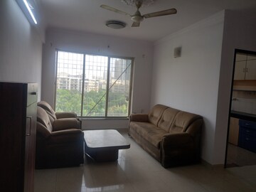 Living Room in 1 BHK Apartment at Dheeraj Enclave, Borivali East – for Rent