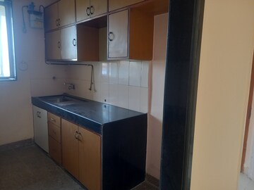 Kitchen in 1 BHK Apartment at Gundecha Marigold, Kandivali East – for Rent