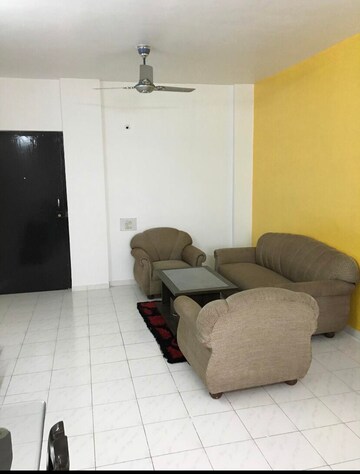 Living Room in 1 BHK Apartment at Meadows Uptown, Viman Nagar – for Rent