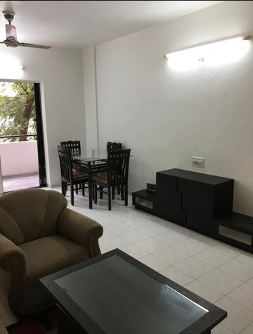 Living Room in 1 BHK Apartment at Meadows Uptown, Viman Nagar – for Rent