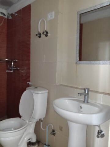 Bathroom in 3 BHK Apartment at Mahagun Mywoods, Sector 16c Greater Noida – for Rent