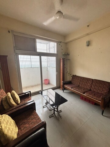 Living Room in 2 BHK Apartment at Rishabh Iris Tower, Ahinsa Khand 2 – for Rent