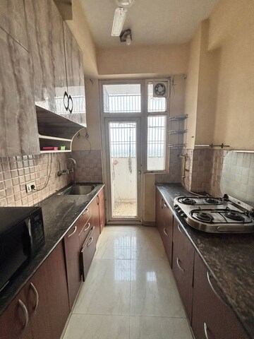 Kitchen in 2 BHK Apartment at Rishabh Iris Tower, Ahinsa Khand 2 – for Rent