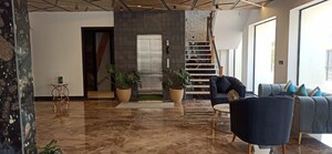 Living Room in 3 BHK Apartment at Hermitage Centralis, Vip Road – for Sale