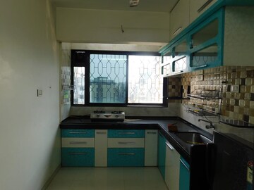 Kitchen in 2 BHK Apartment at Raj Vaikunth CHS, Ulwe Sector 3 – for Rent