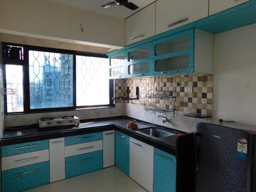 Kitchen in 2 BHK Apartment at Raj Vaikunth CHS, Ulwe Sector 3 – for Rent