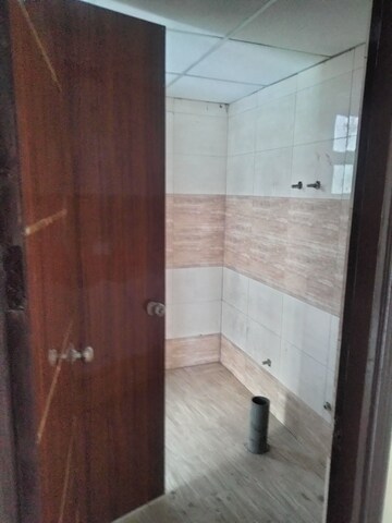 Bathroom in 3 BHK Apartment at Charms Castle Phase II, Raj Nagar Extension – for Sale